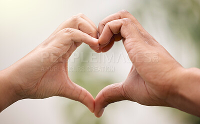 Buy stock photo Heart, hands sign and couple in nature for care, affection or bonding together. Love, hand gesture and man and woman support, trust or empathy, kindness and emoji for commitment, marriage and loyalty
