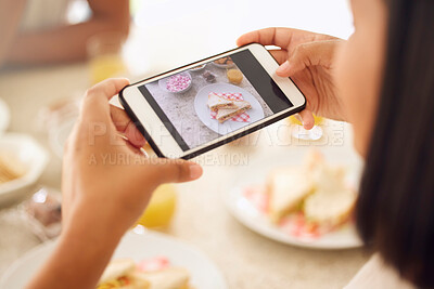 Buy stock photo Shot of an unrecognisable woman taking a photo of her lunch with a smartphone