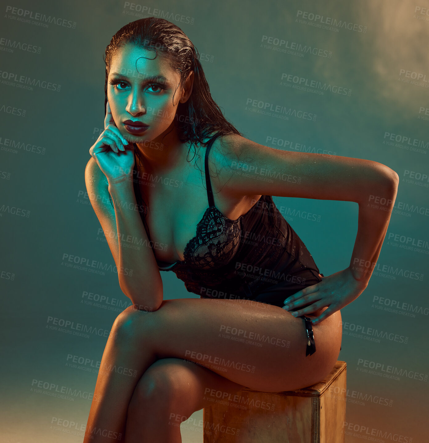 Buy stock photo Portrait, lingerie and woman sitting with studio background for confidence, elegant or sensual style. Body, wet skin and female model on crate for sexy fashion, aesthetic or trendy underwear