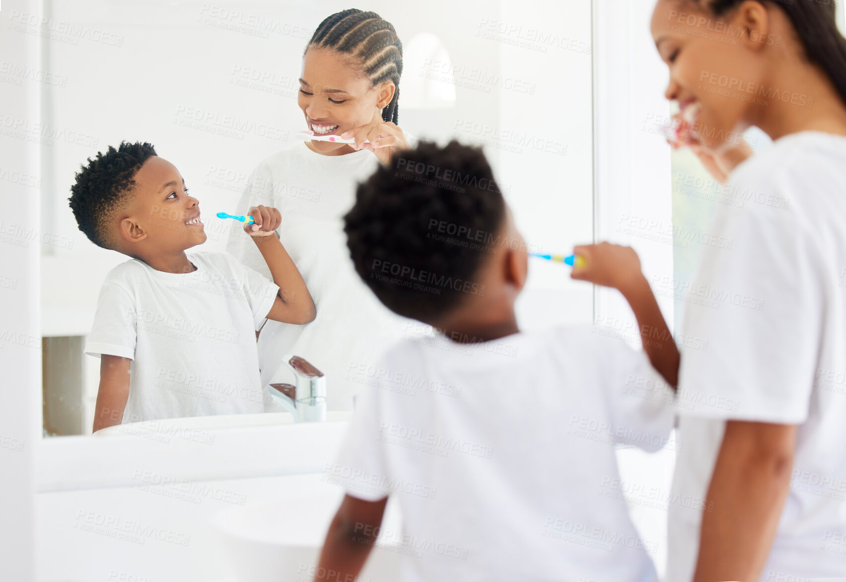 Buy stock photo Happy, mom and boy with toothbrush for brushing teeth for dental health, daily routine and gum wellness. Black family, back and mirror in bathroom or home for oral hygiene, cavity and fresh breath.