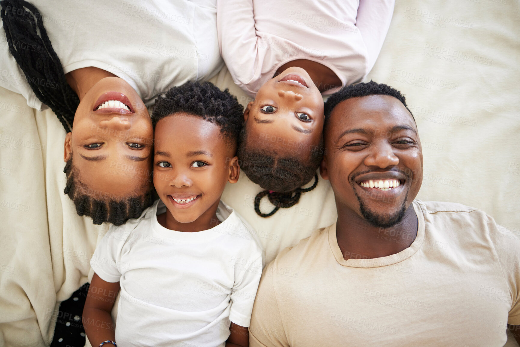 Buy stock photo Black family, portrait and happy kids with parents in bedroom to relax in home above. Face, mom and father in bed with children in top view for rest, comfort and love for siblings bonding together