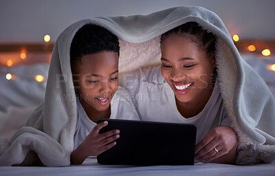 Buy stock photo Mom, son and bedroom with tablet at night for streaming, together with led light for web game. Black parent, boy child and ebook with internet in home for video, online app for learning with digital