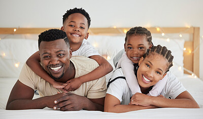 Buy stock photo African family, portrait and hug happy children in bedroom with foster parents to relax in home. Face, mother and father with kids in bed for support, connection and embrace together for adoption