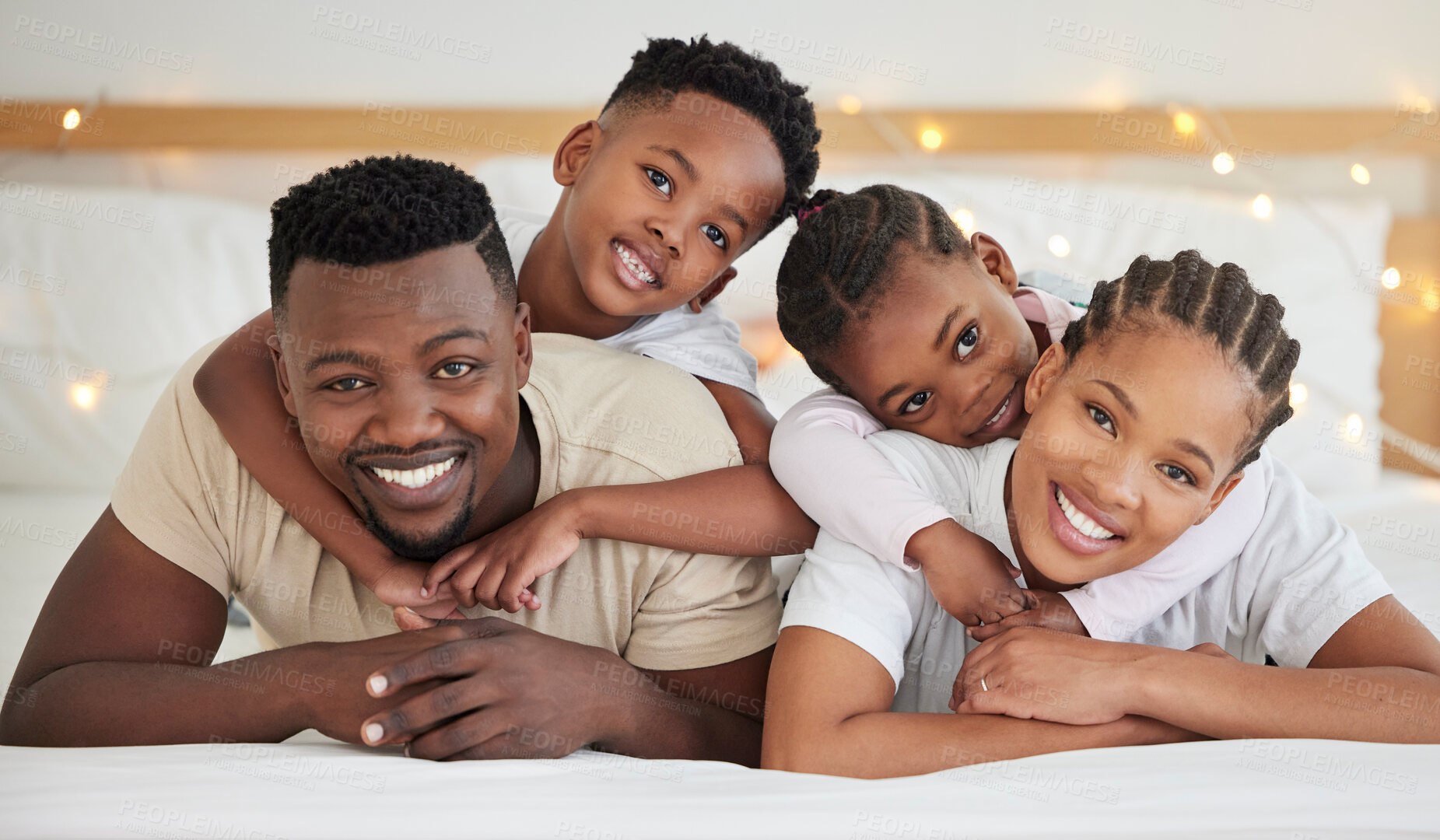 Buy stock photo Black family, portrait and hug happy children in bedroom with foster parents to relax in house. Face, mother and father with kids in bed for support, connection and embrace together for adoption