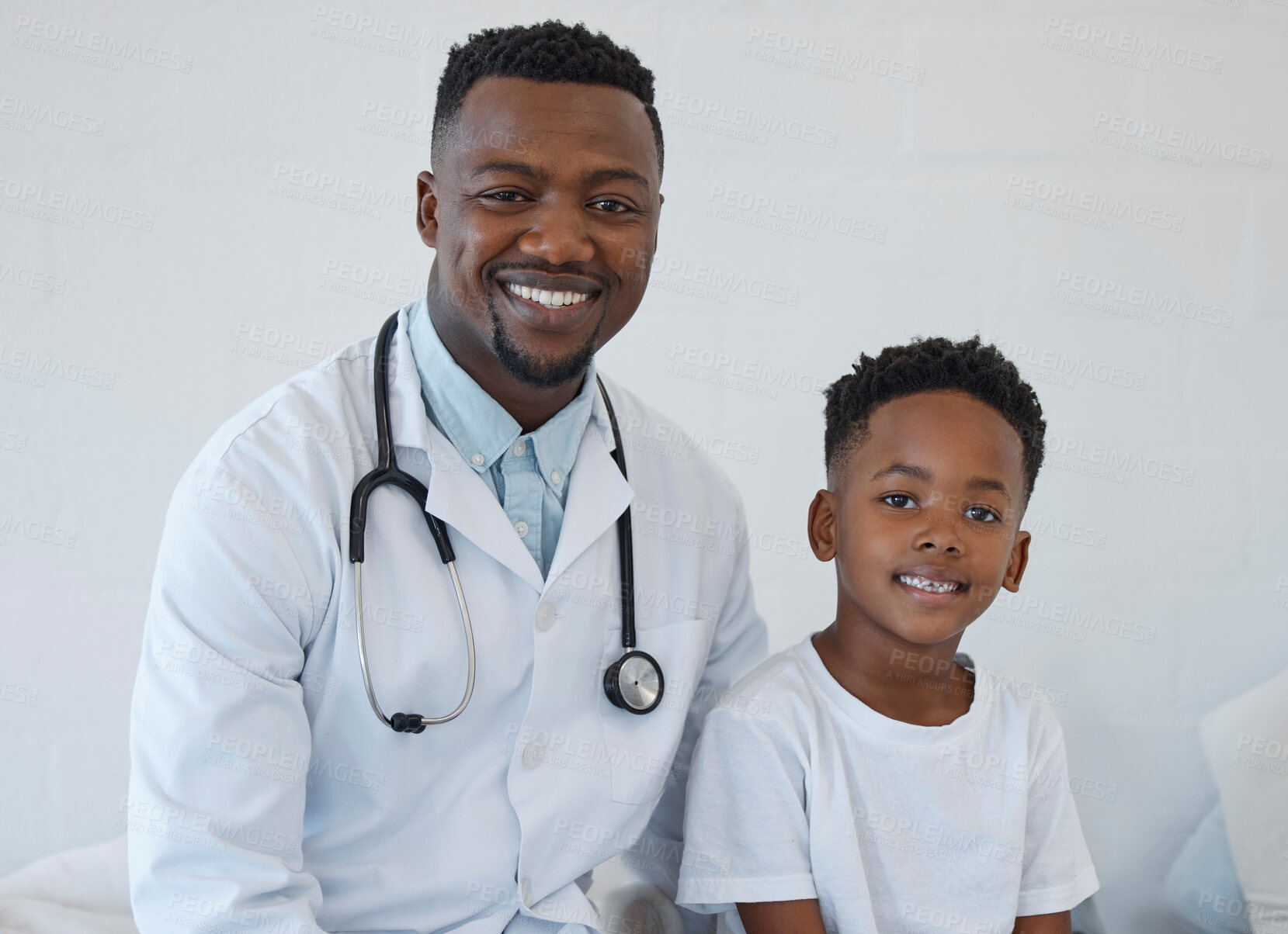 Buy stock photo Portrait, doctor and kid in hospital for consultation, healthcare and wellness or support. Pediatrician, boy child and happy for results in clinic with man, patient and stethoscope for medical exam