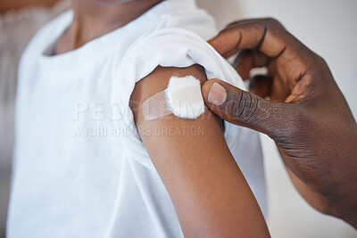 Buy stock photo Vaccine, child and hands of person with plaster for health, wellness and injection in clinic. Healthcare, kid and doctor in hospital for immune system strength, illness prevention and flu shot on arm