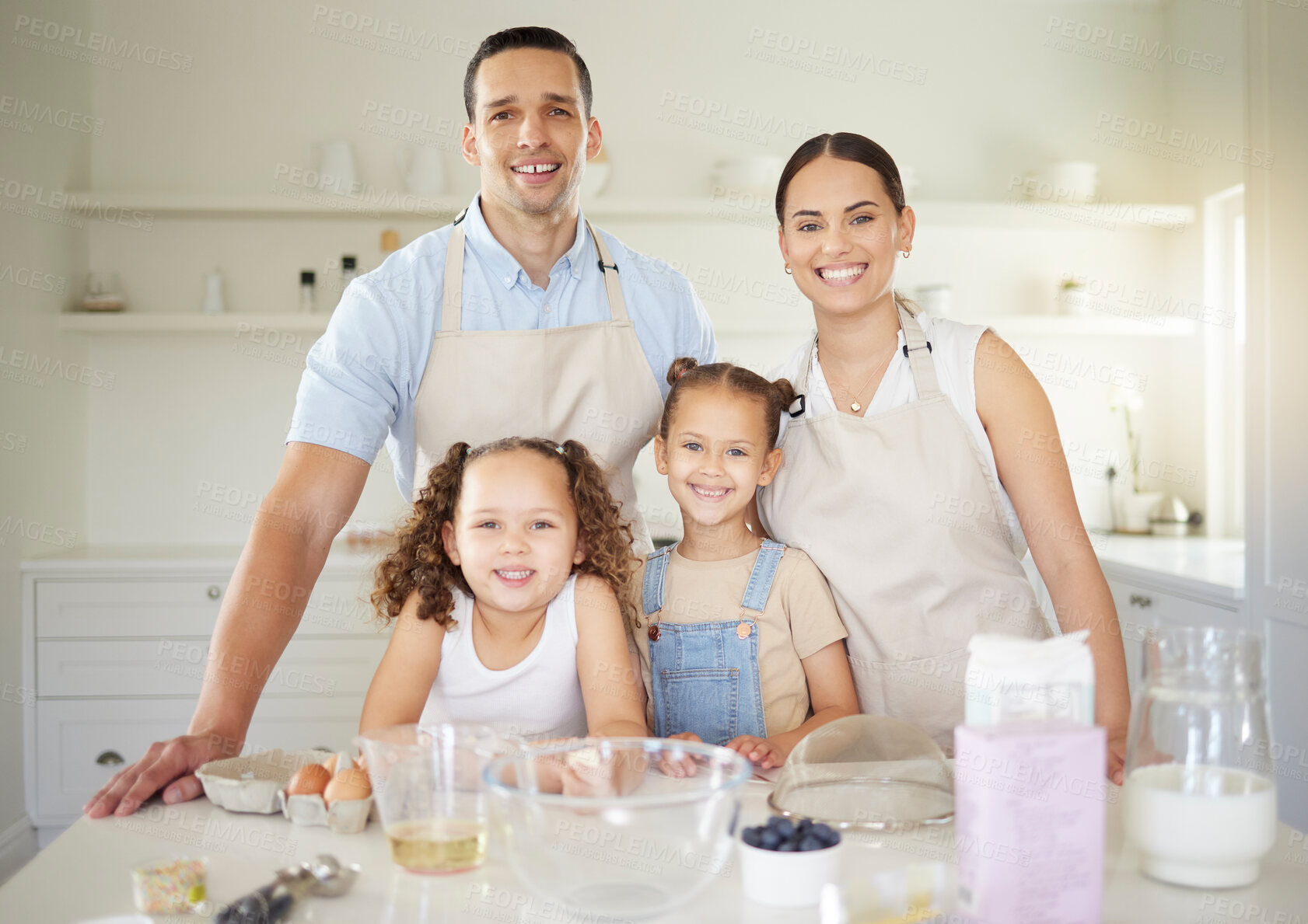 Buy stock photo Family, portrait and baking in kitchen for bonding, teaching and learning with smile, flour and bowl. Mother, children and man in house for cooking, support and development with eggs, milk and oil