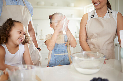 Buy stock photo Family, powder and baking in kitchen for bonding, teaching and learning with smile, flour and bowl. Mother, children and man in house for cooking, help and development with eggs, milk and happiness