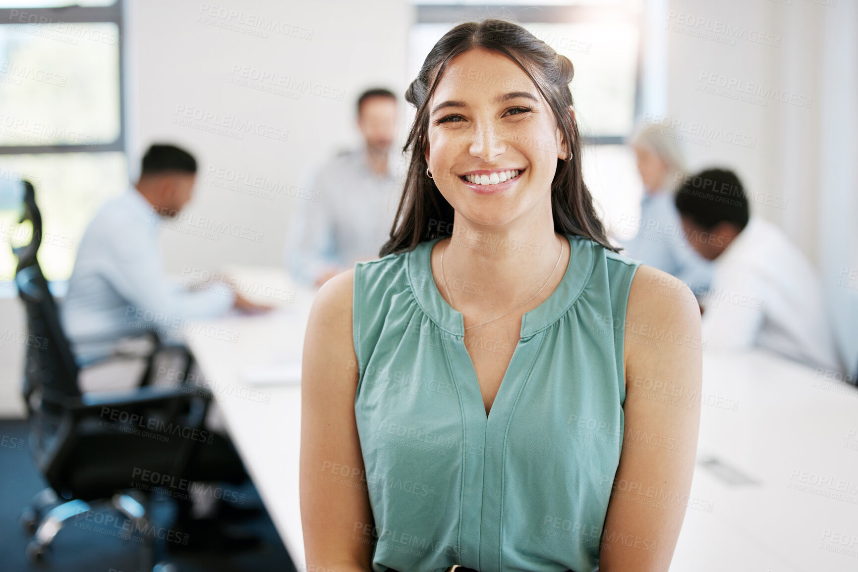 Buy stock photo Portrait of a confident young businesswoman in an office