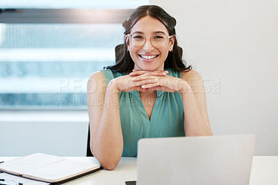 Buy stock photo Portrait of a confident young businesswoman working in an office