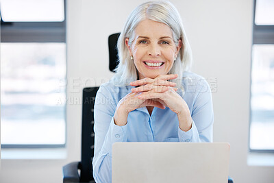Buy stock photo Portrait of a confident mature businesswoman working in an office