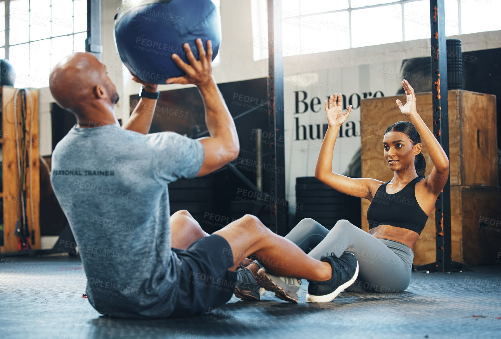 Buy stock photo Fitness, personal trainer and exercise with medicine ball, sit ups and throw to partner to workout abdominal muscle. Man, woman and training equipment for core strength, help and body health in gym