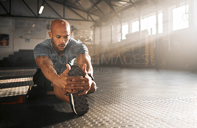 Buy stock photo Gym, man and legs with stretching for fitness, flexibility and prevention of muscle tension for exercise. Floor, male person and bodybuilder with warm up for wellness, training or prepare for workout