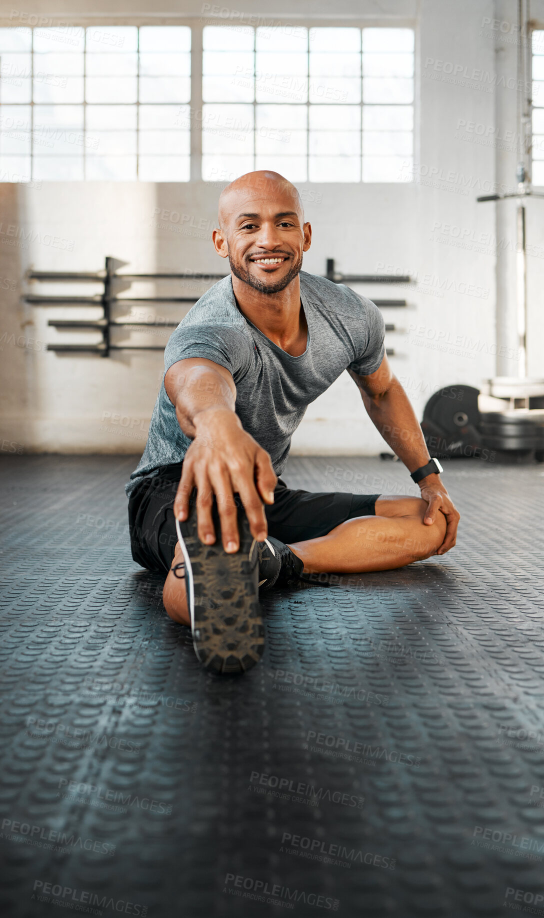 Buy stock photo Portrait, man and legs with stretching for workout, balance and prevention of muscle tension for exercise. Gym, happiness and bodybuilder with warm up for wellness, training and endurance for fitness