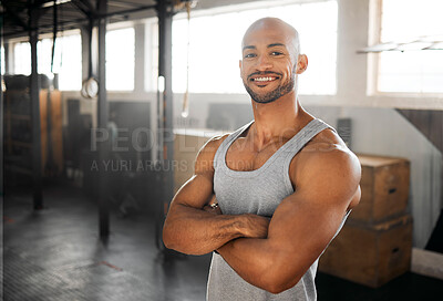 Buy stock photo Shot of a young man taking a break during his workout routine