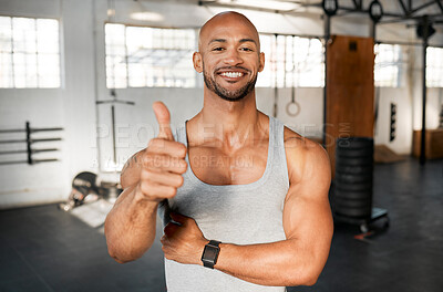 Buy stock photo Bodybuilder, man and portrait with thumbs up in gym for fitness challenge success and muscle growth satisfaction. Athlete, person and smile with hand gesture for body progress and workout achievement