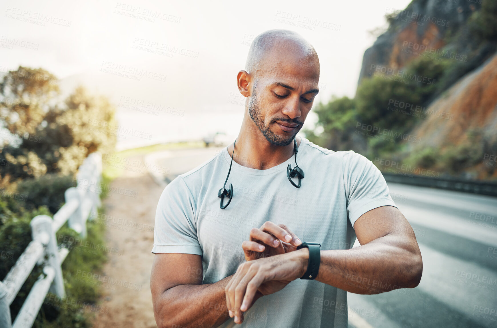 Buy stock photo Fitness, man and checking smart watch outdoor to monitor heart rate, running speed and workout progress. Runner, person and timer with stopwatch in street for performance stats and exercise results