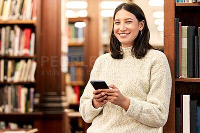 Buy stock photo Portrait, student and girl in library, smartphone and smile with education, typing and connection. Face, person and woman with cellphone, knowledge and college with digital app, internet and school