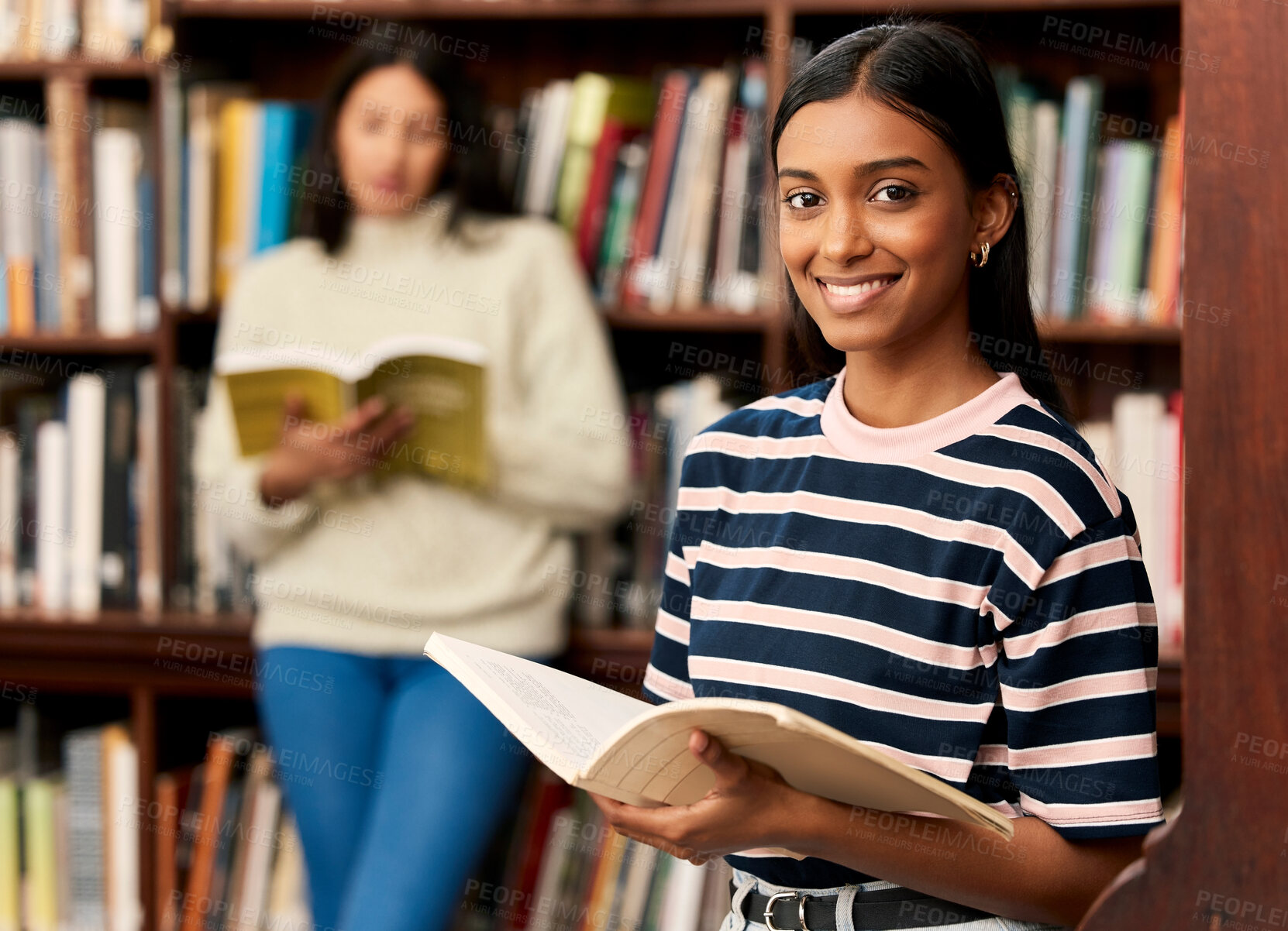 Buy stock photo Library, book and portrait of girl by bookshelf with smile for literature research, learning and knowledge. University, student and education with paper at campus for scholarship, studying and info