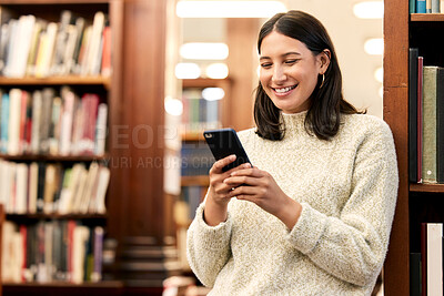 Buy stock photo College, library and smile of girl with phone for campus research, literature website or networking. Scholarship, student and person with smartphone for education, email or media update in London