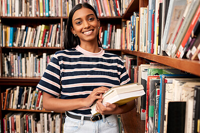 Buy stock photo College, library and portrait of girl by bookshelf with smile for literature research, education and study. Student, school and learning with book at campus for scholarship, knowledge and information