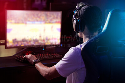 Buy stock photo Gamer, computer screen and man with headphones, live stream and esports subscription from back. Content creator, influencer or streamer with headset for online challenge, video game or night at home.