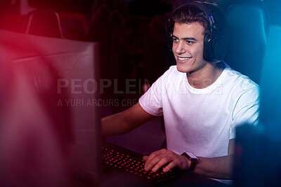 Buy stock photo Gamer, computer and man with headphones, smile and live stream for esports subscription. Content creator, influencer or happy streamer with headset for online challenge, video game or night at home.