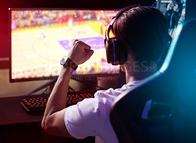 Buy stock photo Gamer, computer and man with headphones, winning celebration and live stream of esports from back. Content creator, influencer or streamer with headset for online achievement in video game in home.