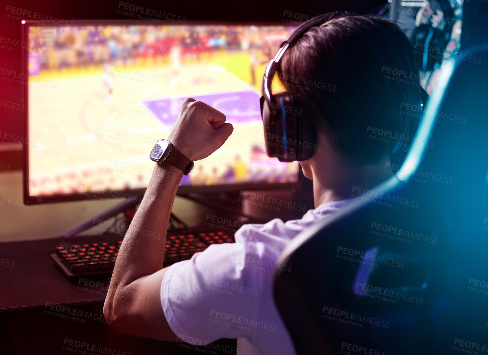 Buy stock photo Gamer, computer and man with headphones, winning celebration and live stream of esports from back. Content creator, influencer or streamer with headset for online achievement in video game in home.