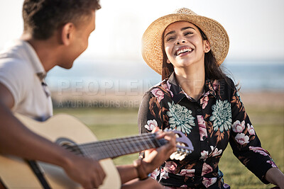 Buy stock photo Happy, love and couple with guitar in nature for and romance, music and entertainment on date. Woman, smile and man with instrument by ocean coast for anniversary, bonding and adventure in Greece