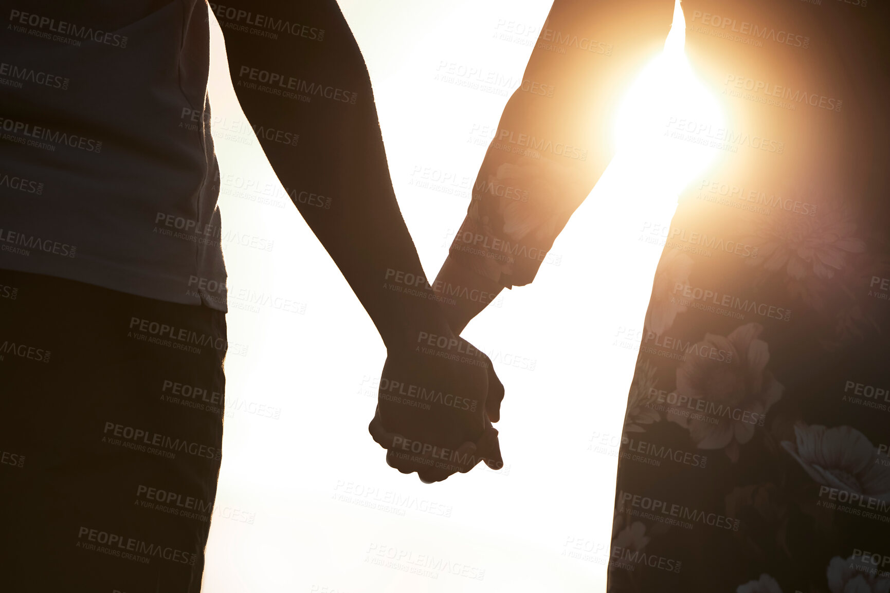 Buy stock photo Couple, silhouette and holding hands at sunset on vacation, holiday or honeymoon in summer at romantic, destination on date. Woman, man and relationship in love or together, memory and travel on trip