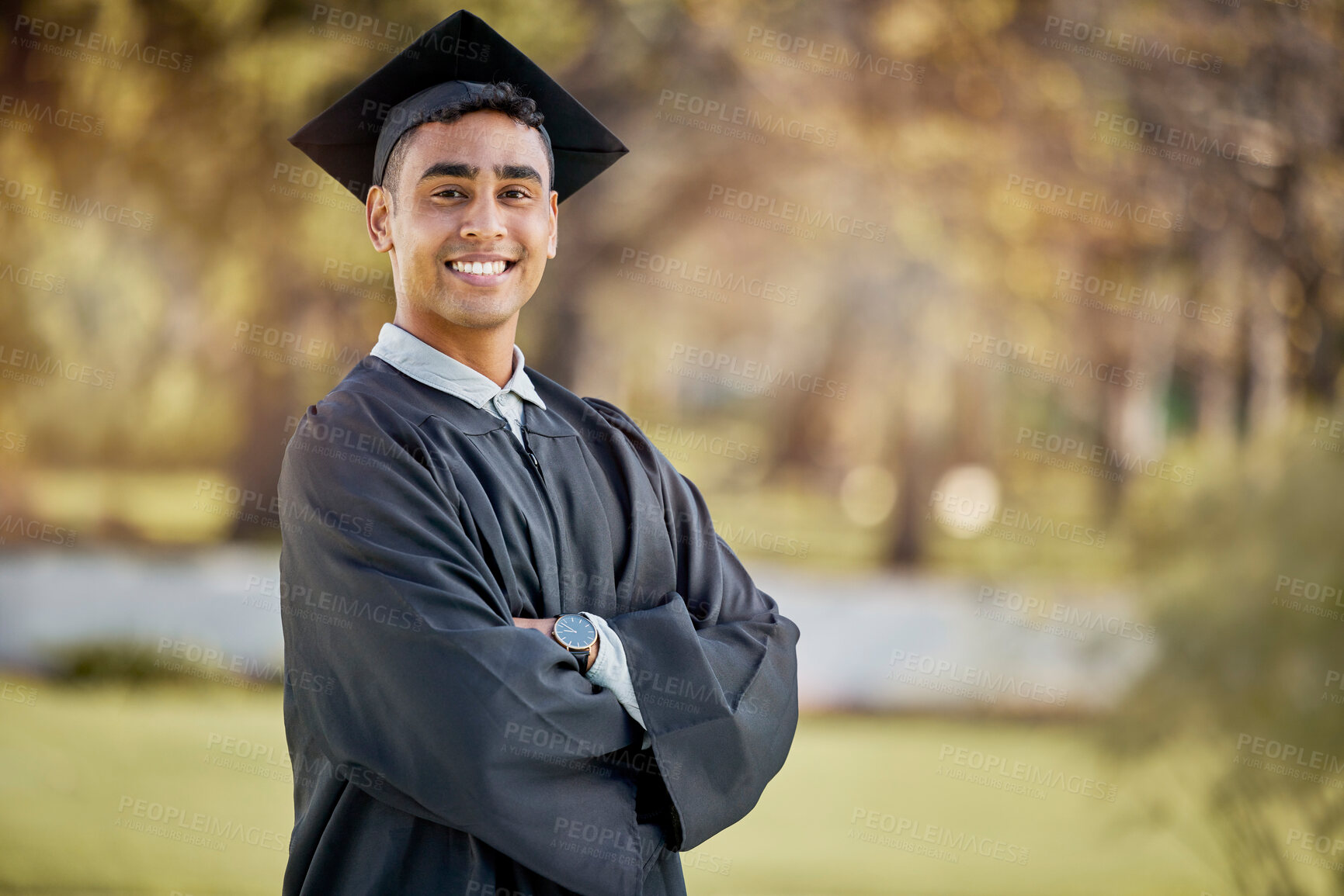 Buy stock photo Portrait of happy man, graduation or student in university campus with degree, scholarship or education. Success, smile or male Indian graduate standing outdoors in college with school achievement 