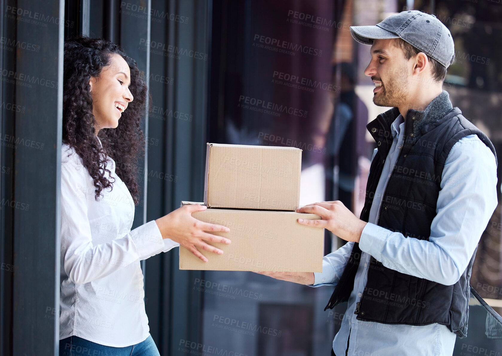 Buy stock photo Shot of a man making a delivery to a customer