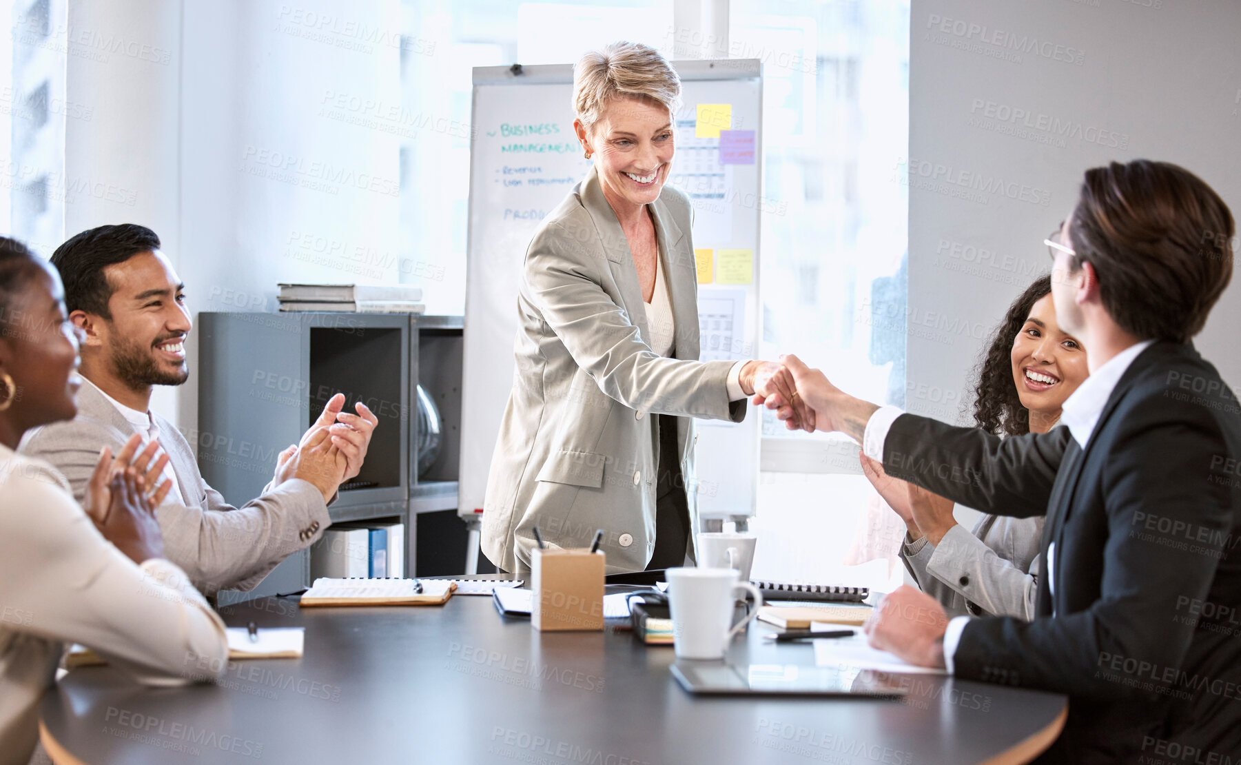 Buy stock photo Handshake, meeting and happy business people in office for teamwork, collaboration and partnership. Corporate, professional and men and women shaking hands for agreement, b2b deal and presentation