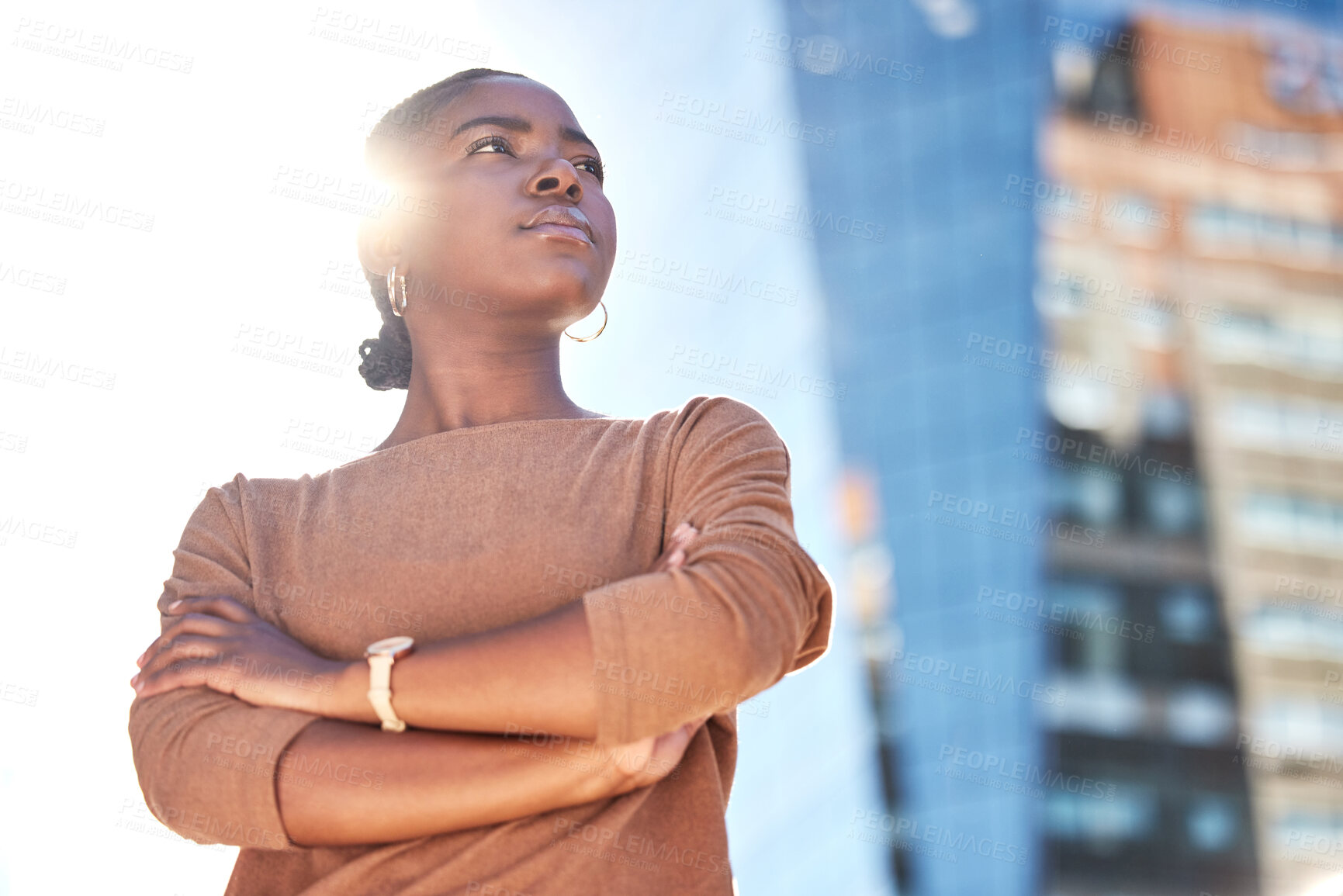 Buy stock photo Crossed arms, thinking and business black woman for ambition mindset, travel and morning commute. Corporate, professional and entrepreneur in urban town for career, working and job opportunity