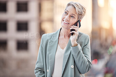 Buy stock photo Mature, business and woman on phone call in city, communication and online conversation for networking. Professional, talking and discussion for company plan, connection and travel in outdoor