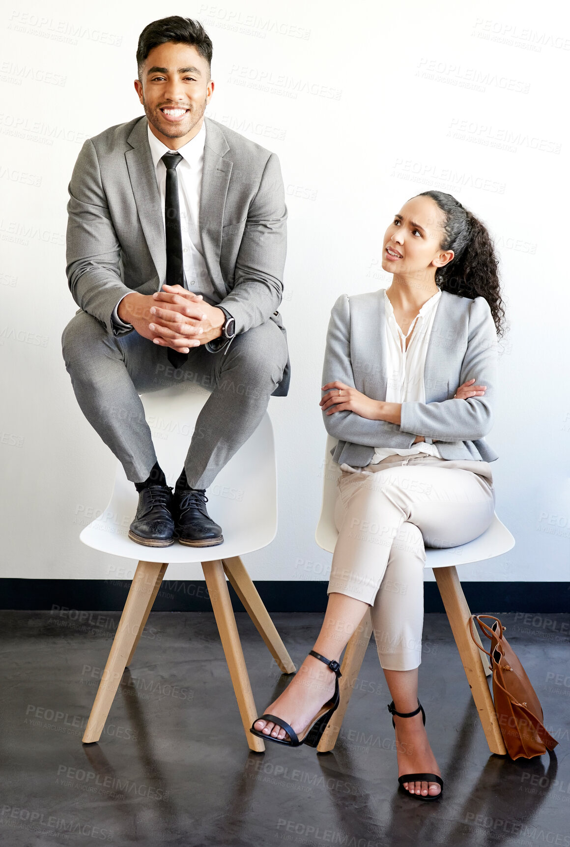 Buy stock photo Man, woman and chair in office for inequality, portrait or stress for pay gap, promotion or benefits. Business people, discrimination and sexism to help male employee for career progress in workplace