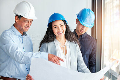 Buy stock photo Architecture, blueprint and portrait of woman with men planning building construction in office or construction site. Female leadership, architect and engineer in strategy meeting for design project.