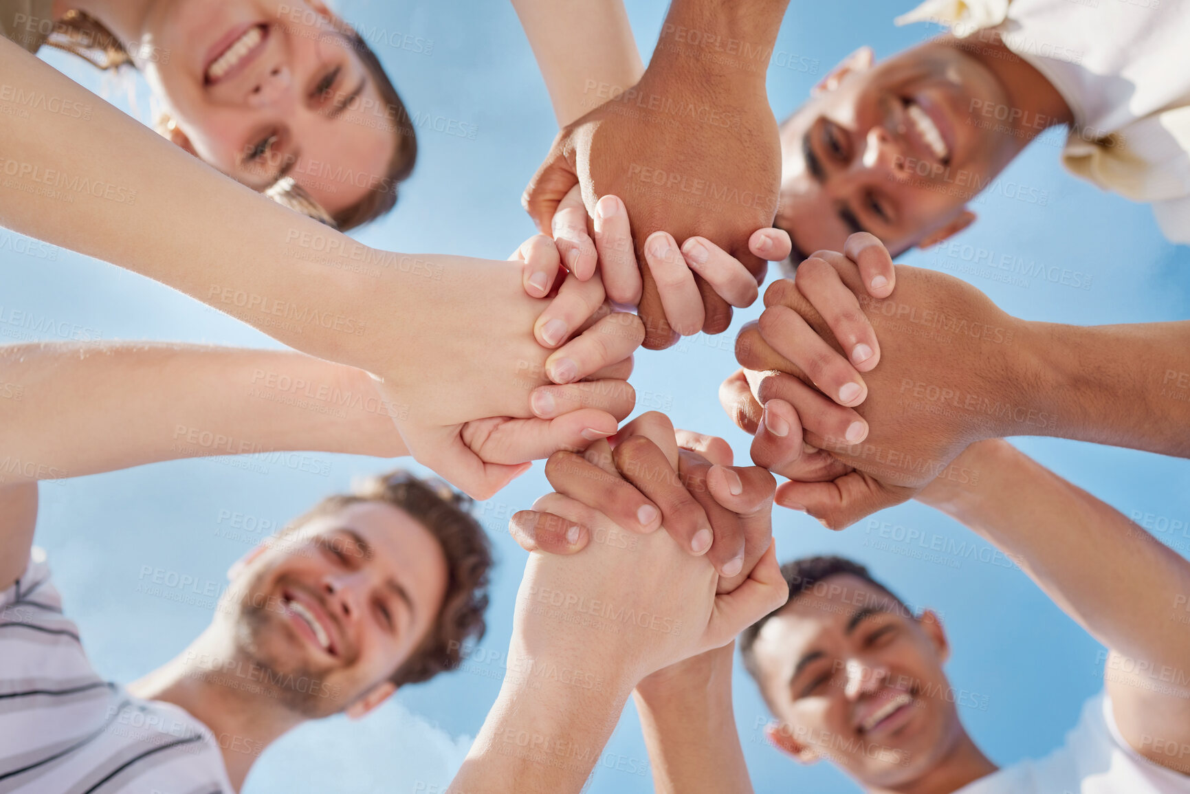 Buy stock photo Below, friends and holding hands for support, motivation or education at campus summer. Diversity, students and collaboration for learning with teamwork, studying or scholarship at college together