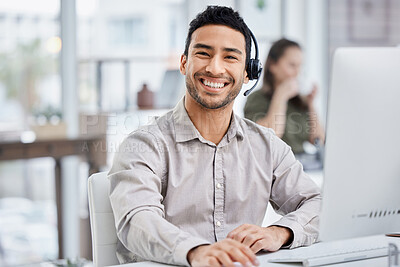 Buy stock photo Customer service, portrait of male call center agent with headset and with computer at his desk of a modern office workplace. Telemarking or support, communication and male person at his workstation