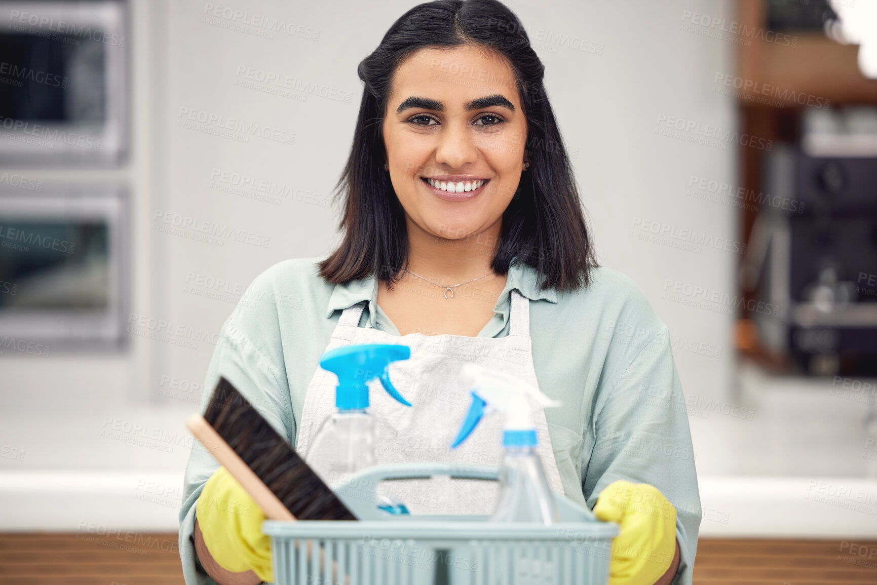 Buy stock photo Cleaner, portrait and smile with bucket, brush and spray in house for spring cleaning, scrub and dirt on counter. Housekeeper, happy and woman with detergent in bottle for dust in home by kitchen