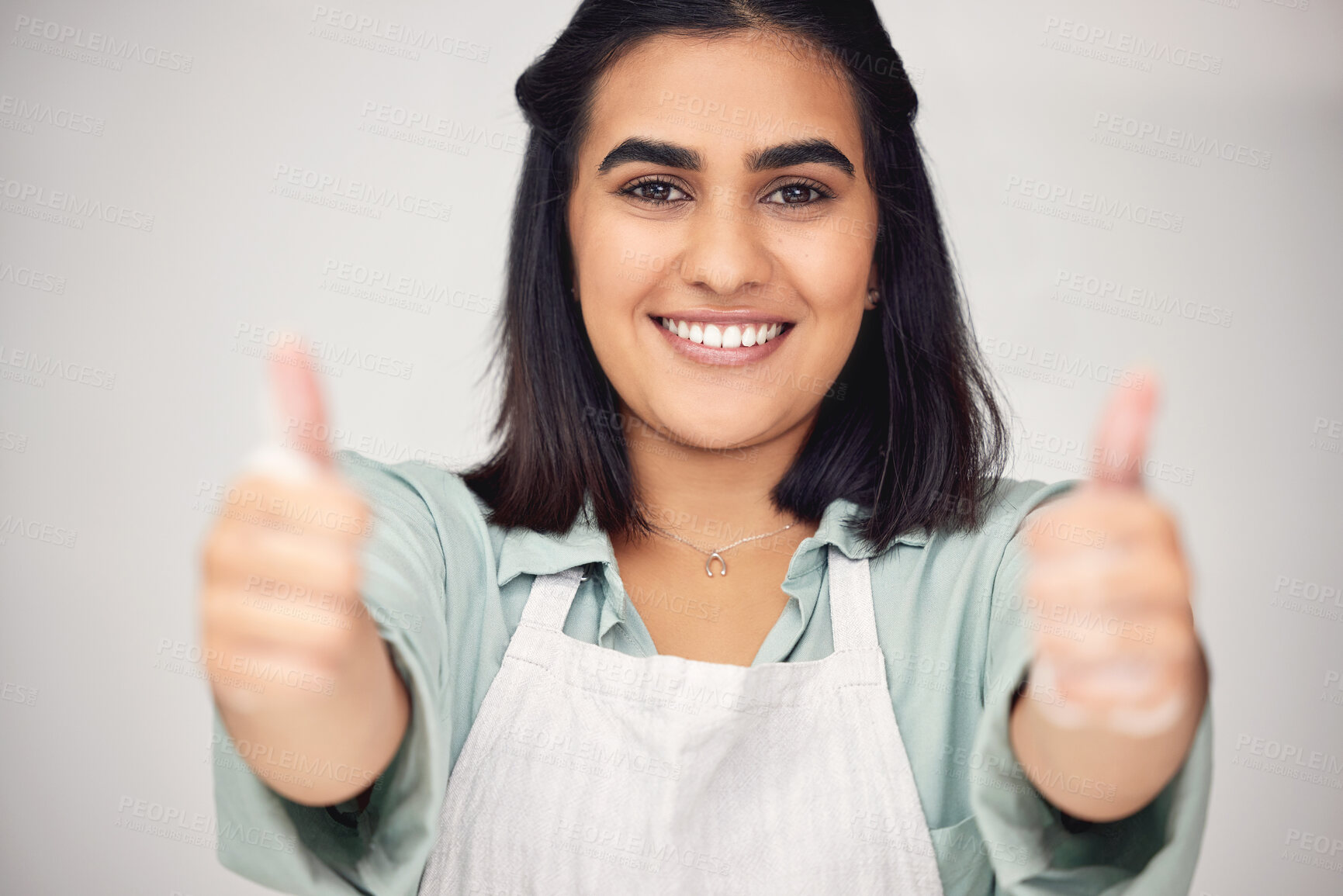 Buy stock photo Woman, thumbs up and cleaner in studio portrait, foam and agree on chemical cleaning. Female person, antibacterial promotion and motivation to disinfect, maid and support service on white background