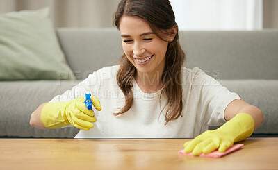 Buy stock photo Woman, cleaning and wood in home with smile for housework, spray and cloth for furniture. Female cleaner, or table with container and soap for washing, hospitality service in house or apartment