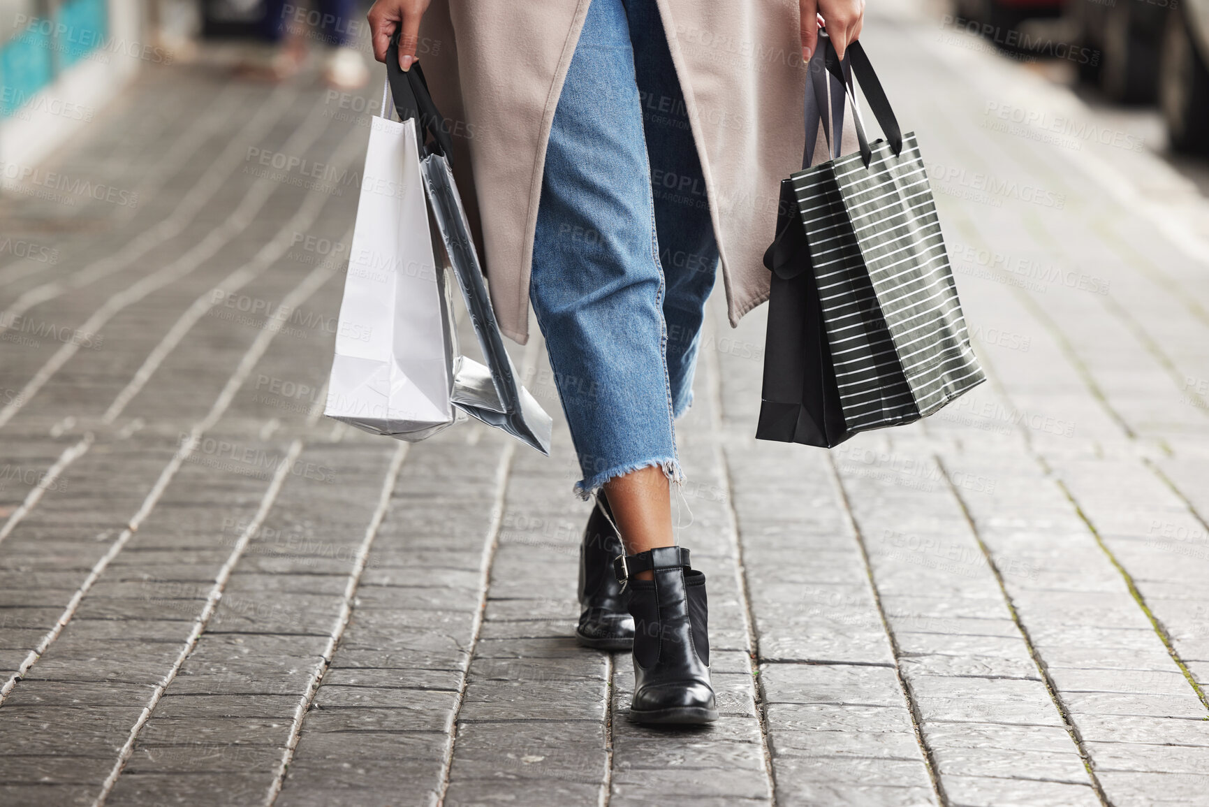 Buy stock photo Woman, shoes and walking with shopping bags in street for fashion, purchase or heels in city. Legs of female person, shopper or customer in stroll on sidewalk with gifts for buying in an urban town