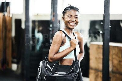 Buy stock photo Bag, fitness and portrait with black woman athlete in gym, ready for training or workout. Exercise, smile and strong with happy sports person in health club for physical activity or improvement