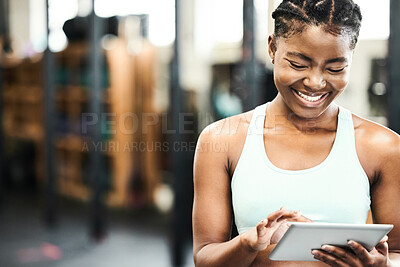 Buy stock photo Happy, black woman with a tablet and in a gym with a smile for inventory. Fitness or workout, training or exercise for motivation and African female athlete smiling for health wellness in sportswear