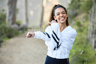 Buy stock photo Shot of a young woman taking a break during an outdoor run