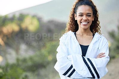 Buy stock photo Shot of a young woman taking a break during an outdoor run