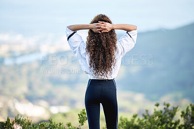 Buy stock photo Shot of a woman taking a break to enjoy the view during a workout