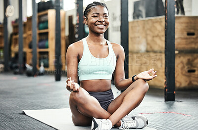 Buy stock photo Black woman, relax and yoga with meditate in gym for calm body, mental health and wellness. African female yogi, zen and spiritual with lotus pose for peaceful mindset, holistic exercise and smile